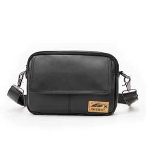 Black leather crossbody bag, vintage messenger style with flap and adjustable strap for men.