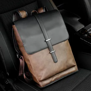 Vintage PU leather backpack for men, casual large capacity travel school computer bag.