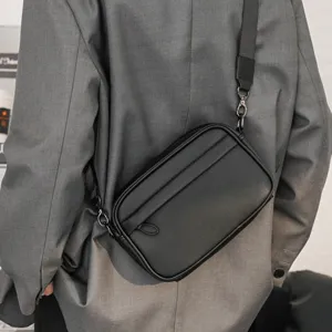 Men's black PU leather cross-body shoulder bag, trendy Korean style daily casual chest bag.