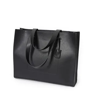 Black PU leather tote bag detail view, casual shoulder handbag with handle and stylish minimalist design