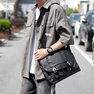 Waterproof oxford cloth messenger bag, retro casual shoulder bag, stylish crossbody bag for men.