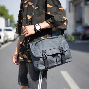 Waterproof oxford cloth messenger bag for men casual crossbody shoulder bag stylish design.