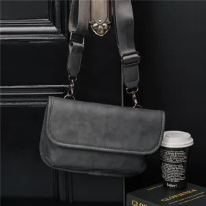 Detailed view of the dark grey vintage men's crossbody bag with adjustable strap and metal hardware.