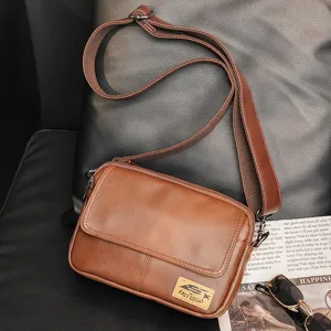 Men vintage brown leather crossbody bag casual messenger shoulder bag with a wide adjustable strap.