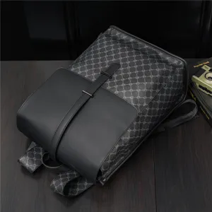 Black patterned backpack for men, large capacity travel school bag with stylish retro design.