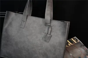 Grey PU leather tote bag for women and men, stylish casual shoulder handbag with top handles.