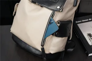 Zaino bicolore da uomo in ecopelle elegante con tasca frontale con zip e design moderno.