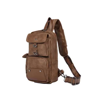 Detailed view of casual men's brown leather sling bag with multiple pockets and durable straps.