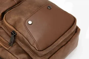 Men vintage leather chest bag detail view, stylish brown sling shoulder bag with pocket