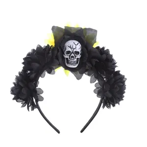 Close-up detail of Halloween skull headband featuring black roses and a bright yellow flower.