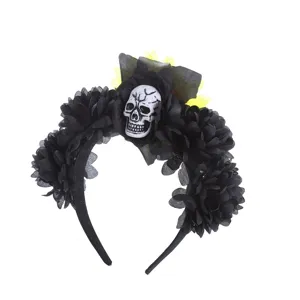 Detail view of Halloween black flower headband featuring a spooky skull design and yellow flower accents.