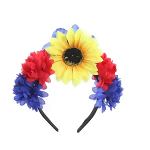 Detail view of a colorful festival flower headband with sunflower and red blue blooms.