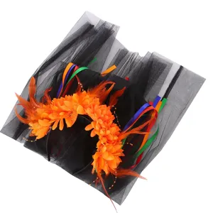 Halloween feather headband with orange flowers and black mesh veil for party costume.