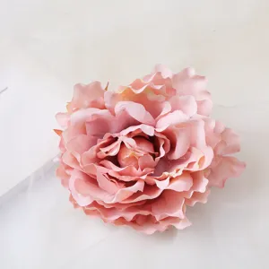 Pink artificial peony flower head for hair clips, bridal wedding accessories and DIY crafts.