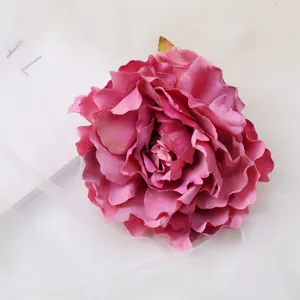 Pink artificial peony flower head for handmade hair clips, bridal headwear and DIY crafts.