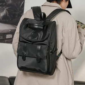 Stylish black backpack for men and women, large capacity casual travel school bag for students.