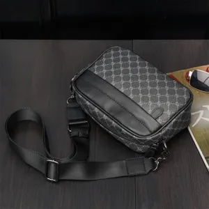 Men casual messenger crossbody bag with retro monogram pattern and black leather trim.