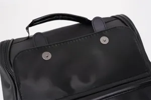 Sleek black casual backpack detail shot, durable material, stylish daily travel bag.
