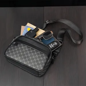 Men's casual messenger shoulder bag stylish crossbody bag with classic pattern and leather trim.
