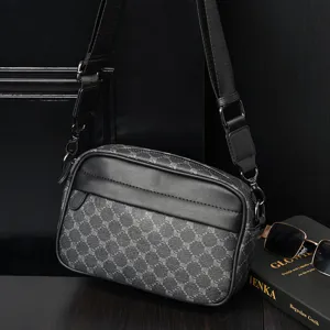 Men's casual messenger shoulder bag with trendy monogram pattern and black leather trim.