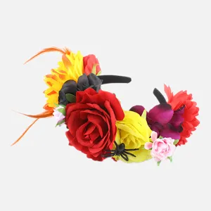 Detailed view of the Halloween floral headband featuring red roses, feathers, and spider.