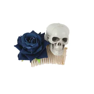 Close-up of Halloween Gothic dark blue fabric rose and skull hair comb accessory detail.
