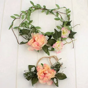 Detail view of bohemian artificial peony flower crown and matching floral accessory set.