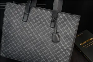 Black PU leather tote bag closeup, showing exquisite texture and durable double handles style.