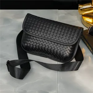 Classic woven leather black crossbody chest bag for men and women, stylish casual shoulder bag.