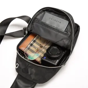 Men's camo chest bag detail view showcasing spacious interior storage and versatile daily use design.