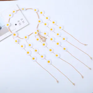 Cerchietto floreale margherita boho con nappe, grazioso accessorio per capelli girasole.