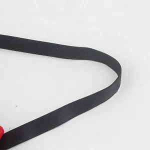 Close-up detail of the black elastic headband strap, showing durable stretch fabric and fine texture.