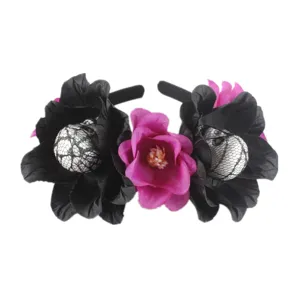 Halloween party skull flower headband with black and pink fabric flowers and mesh skull.
