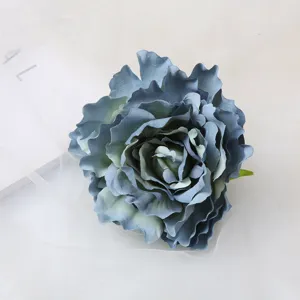 Detailed closeup of elegant blue artificial peony flower head, perfect for DIY hair accessories.