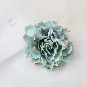 Artificial peony hair flower accessory, elegant teal fabric floral hairpin for women and brides.
