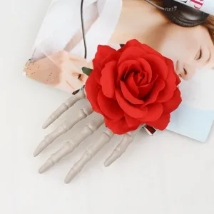 Halloween gothic skeleton hand rose hair clip, unique spooky design for cosplay party.