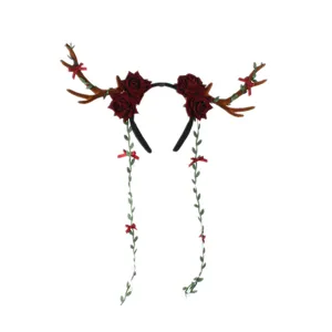 Detailed view of Christmas reindeer antler headband featuring red roses, green vines and bows.