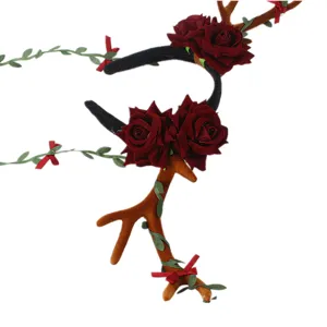 Exquisite Christmas deer antler rose headband with green leaves, perfect for holiday party dress up.