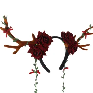 Christmas deer antler headband with dark red roses and green vines for party dress up.