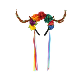 Christmas reindeer antler headband with colorful fabric flowers and ribbons for holiday party decor.