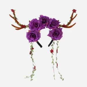 Christmas Halloween antler headband with purple roses and green vines for festival party wear.