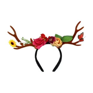 Detailed view of the Christmas reindeer antler floral headband with roses and butterfly decor.