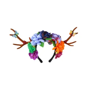 Floral reindeer antler headband with colorful fabric flowers and butterflies for party dress up.