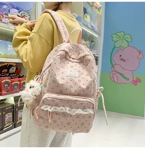 Pink corduroy backpack for women and girls, cute student school bag with sweet lace trim.