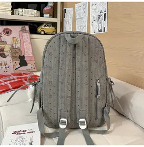 Corduroy cute backpack detail showcasing soft fabric, delicate flower print, and practical side pockets.