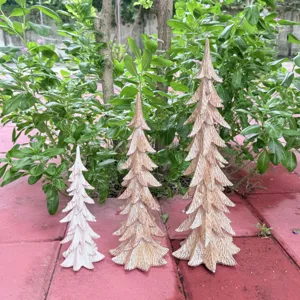 Resin Christmas tree figurine set for garden and yard holiday decorative display details.