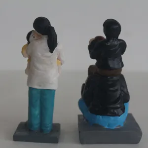 Resin family figurines set for sandplay therapy and home decor, detailed parent-child models.