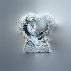 Detail shot of a resin angel praying inside a hollow heart, ideal for memorial decoration.