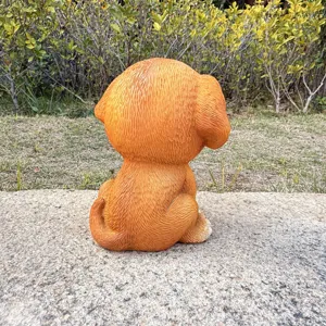 Cute sitting puppy resin ornament, back view detail shot for outdoor garden and home decor.