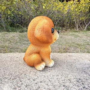 Resin puppy figurine detail view, cute sitting dog ornament for garden lawn outdoor decor.